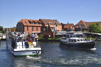 Europe, Germany, Mecklenburg-Western Pomerania, island town of Malchow, Lake Malchow, at the swing