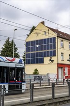 Residential building in Herne, vertical photovoltaic modules were installed at the top of the