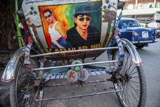 Film star Shah Rukh Khan, hand-painted picture on cycle rickshaw, Calcutta or Kolkata, West Bengal,