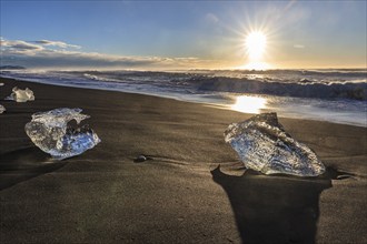 Ice floes on the beach, waves, sunny, morning mood, winter, Diamond Beach, Breidamerkursandur,