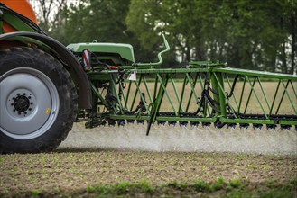 Agriculture, pesticide being sprayed on a field, sugar beet seedlings, North Rhine-Westphalia,