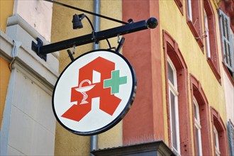 Heidelberg, Germany, July 28th 2024: Logo of German Pharmacy Association hanging from building,