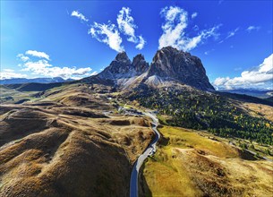 The peaks of the Sassolungo Group, Passo Sella, drone shot, Val Gardena, Dolomites, Autonomous