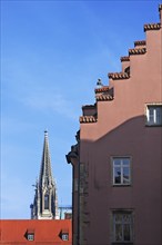 Tower of Regensburg's St Peter's Cathedral, completed around 1860, on the right an old gabled