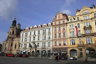 Historic houses and the baroque St Nicholas Church on the Old Town Square, Prague, Czech Republic,