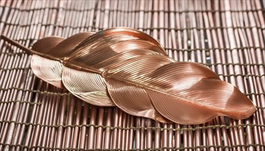 Metal, copper, arts and crafts, piece of jewellery in leaf shape made of copper