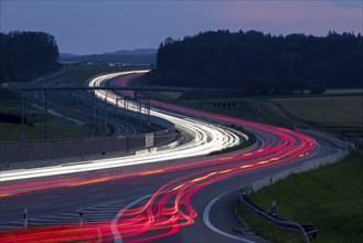 Tracers on the A8 motorway, winding road, evening, long exposure, Swabian Alb, Baden-Württemberg,