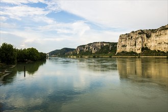 Old suspension bridge over the Rhone and rocks, Passerelle Marc Seguin, Tain-l'Hermitage,