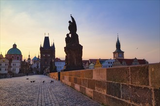 Charles Bridge with Old Town Bridge Tower, morning atmosphere, Prague, Czech Republic, Europe