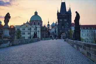 Charles Bridge with Old Town Bridge Tower, morning atmosphere, Prague, Czech Republic, Europe