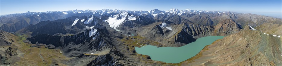 Mountain panorama, aerial view, 4000 metre peak with glacier, mountain pass and mountain lake