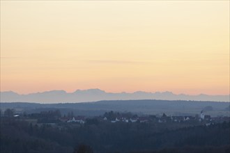 Alpine panorama near Magolsheim. Säntis, Swiss Alps at sunset with a view of Mehrstetten. View from