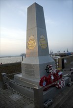 Merchant Navy memorial with wreaths, Harwich, Essex, England, UK