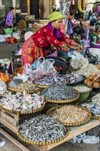 Traditional authentic food market, seller, woman, fish, fish seller, fresh, food, nutrition, sale,