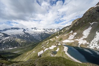 Picturesque mountain landscape with blue mountain lake, Schwarzsee, glacier Hornkees and Waxeggkees