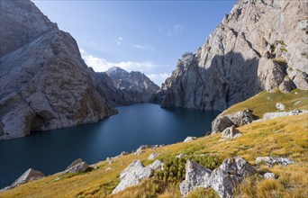 Mountain lake Kol Suu rocky steep mountains, Kol Suu Lake, Sary Beles Mountains, Naryn Province,