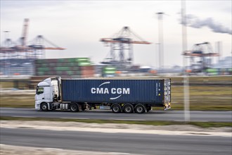 Container lorry, bringing containers to Euromax Container Terminal, the seaport of Rotterdam,