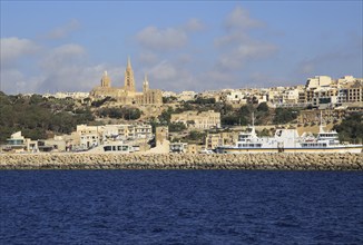 View from Gozo Channel Line ferry ship approaching port of Mgarr, Gozo, Malta, Europe