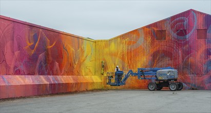 American street artist Douglas Hoekzema, also known as HOXXOH paints a wall in Ystad, Skåne County,