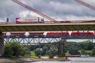 The Beeckerwerth Rhine bridge of the A42 motorway, truck traffic, in front of it the Haus-Knipp