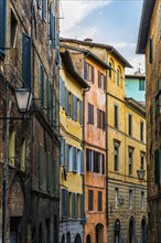 Colourful houses in an alley, old town, facade, architecture, colourful, mediterranean, tourism,