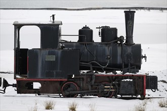 Historic mine railway in winter landscape, Kongsfjord, Ny-Ålesund, Spitsbergen Island, Svalbard and