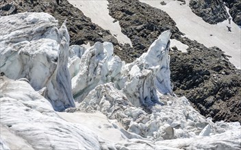 Rutted glacier ice with crevasses, high alpine mountain landscape, La Jonction, Chamonix,