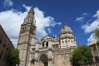 Magnificent cathedral in Toledo with Gothic architecture under a bright blue sky, Toledo,