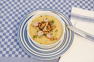 Swabian cuisine, potato soup with string sausages and pretzel croutons, hearty, savoury, typical