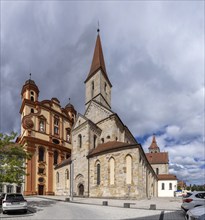 Protestant town church, on the right the Catholic basilica of St Vitus in the architectural style