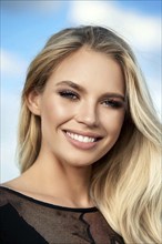 An attractive blonde woman with beautiful teeth, make up, studio, AI generated