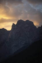 The Kaiser Mountains glow in the sunrise in Kufstein, 10.07.2024