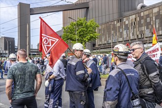 Steelworkers at a demonstration in front of the headquarters of ThyssenKrupp Steel Europe in