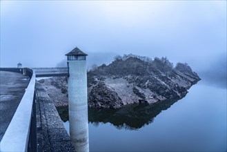 The dam wall of the Urft dam, in the Eifel, reservoir, in winter, fog, near Schleiden, North