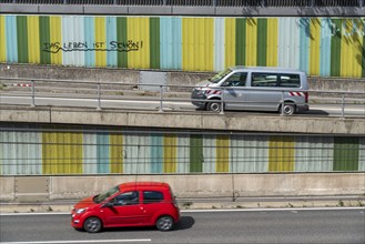 Motorway A40, Ruhrschnellweg, in the through road in Essen, noise barrier, with the slogan, life is