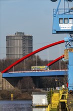 Gasometer of the Prosperität coking plant in Bottrop, cranes in Essen city harbour, motorway bridge