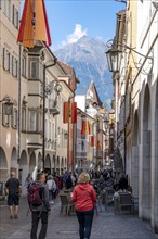 Via Portici, narrow shopping street in Merano, South Tyrol, Italy, Europe