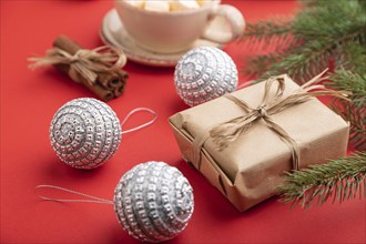 Christmas or New Year composition. Decorations, box, cinnamon, silver balls, fir and spruce