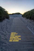 North Sea island Langeoog, beach access with luminous poem, light installation, When the tide goes