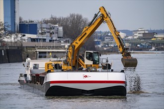 Dredger on the Rhine, dredging gravel into the Rhine, near Leverkusen, North Rhine-Westphalia,