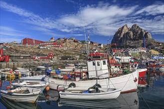 Harbour with boats and houses, Inuit settlement, Heart Mountain, summer, sunny, Uummannaq, West