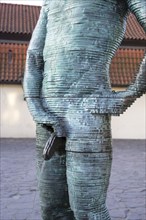 Two male figures peeing, sculpture by the artist David Cerny in front of the Franz Kafka Museum,