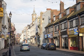 View of the main shopping street, High Street, Ilfracombe in winter evening light, north Devon,