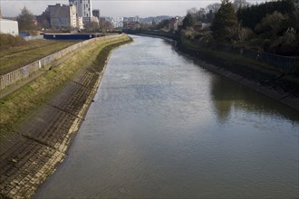 Concrete revetments reinforcing river banks to increase channel efficiency, River Gipping, Ipswich,