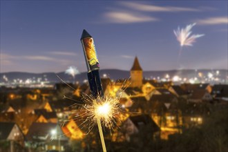 Photomontage, Ignited rocket, fireworks on New Year's Eve, view of Korb-Steinreinach in the Rems