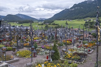 Cemetery with wrought-iron grave crosses, Castelrotto South Tyrol Italy