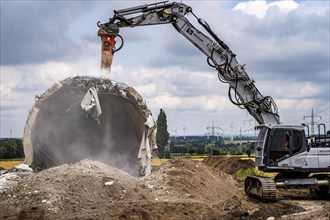 Demolished tower of a 20 year old wind turbine, in the Werl wind farm, 5 old Enercon E-66 turbines