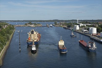 Cargo ships waiting in front of the lock, Kiel Canal, Holtenau, Kiel, Schleswig-Holstein, Germany,