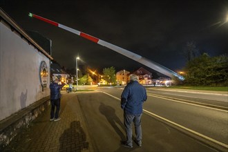 Transport of a 68 metre long, 22 tonne blade of a wind turbine, here in Schwelm, onlookers, with a