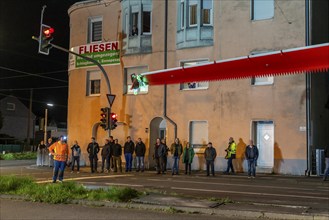 Transport of a 68 metre long, 22 tonne blade of a wind turbine, here in Schwelm, onlookers, with a